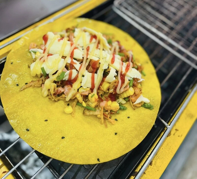 Top 6 quán bánh tráng nướng ở Vinh: Thơm, giòn rụm, full topping